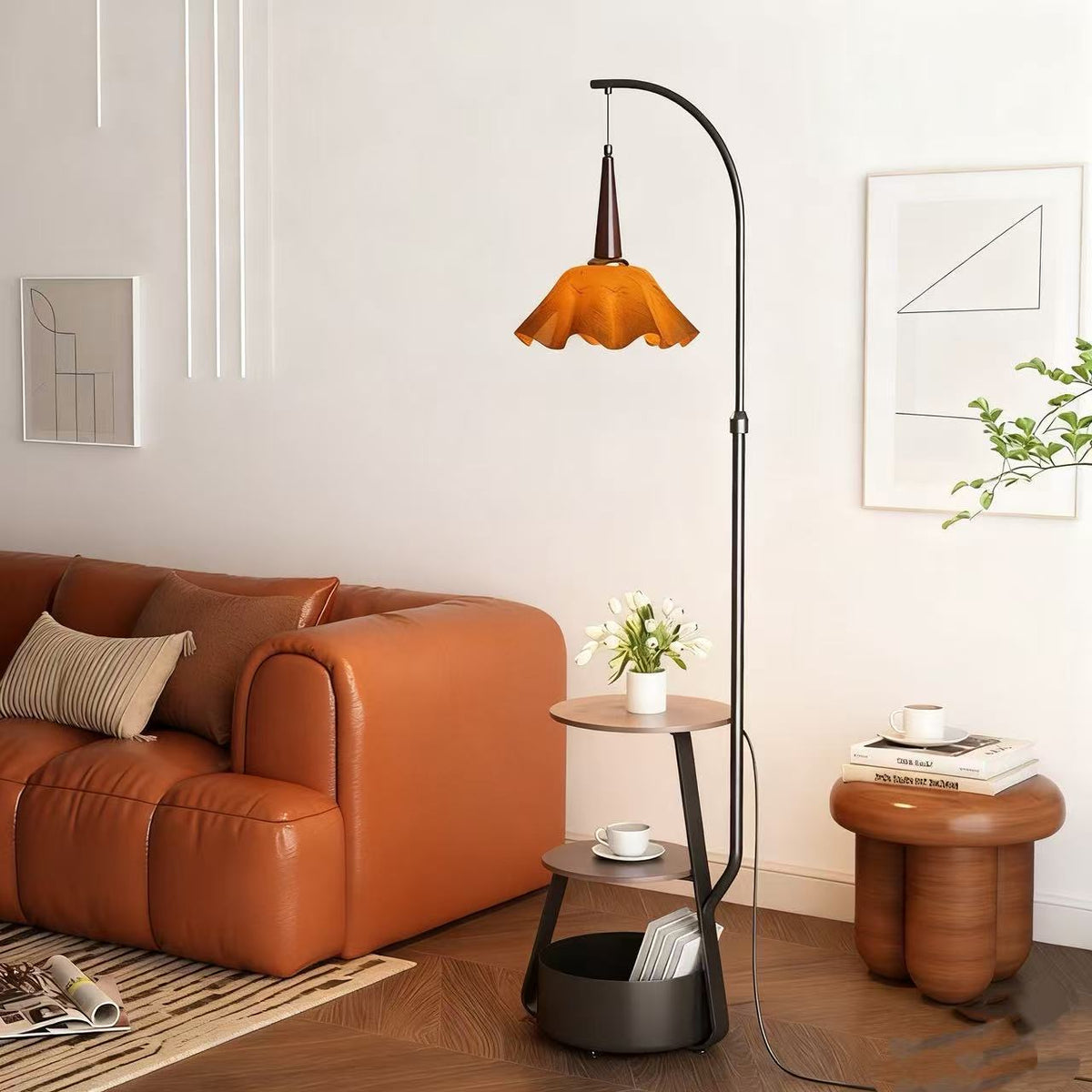 Living room with a brown leather sofa, floor lamp, and small table.