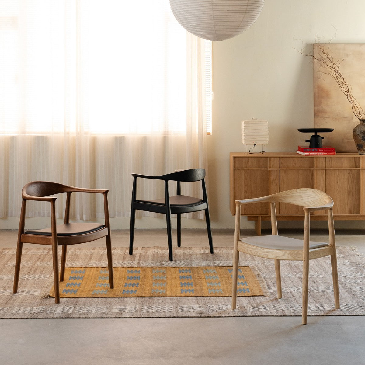 Soren Solid Ash Wood Dining Armchair – Sculptural Curved Back Chair
