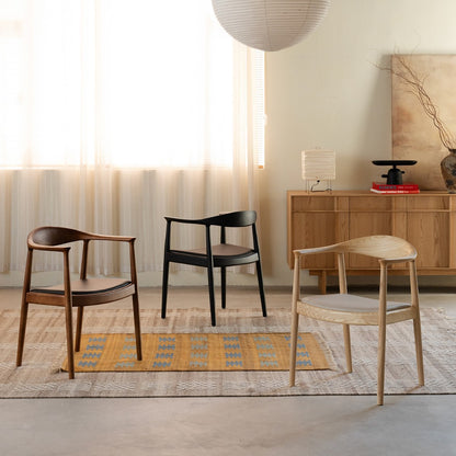 Soren Solid Ash Wood Dining Armchair – Sculptural Curved Back Chair