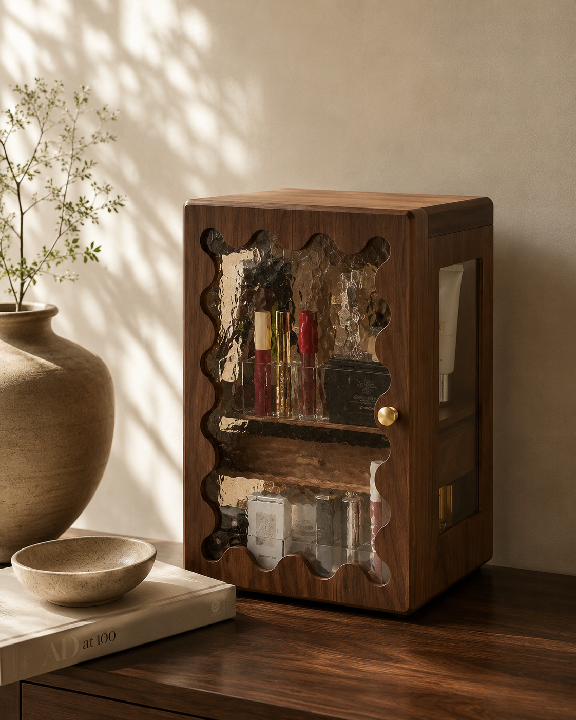 Wooden cabinet with glass doors on a wooden floor with a plant and vase in the background.